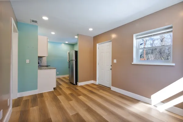 a view of a hallway with a workspace