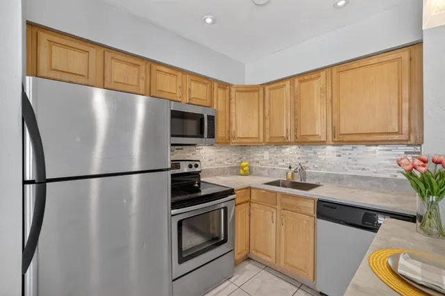 a view of kitchen with furniture and window