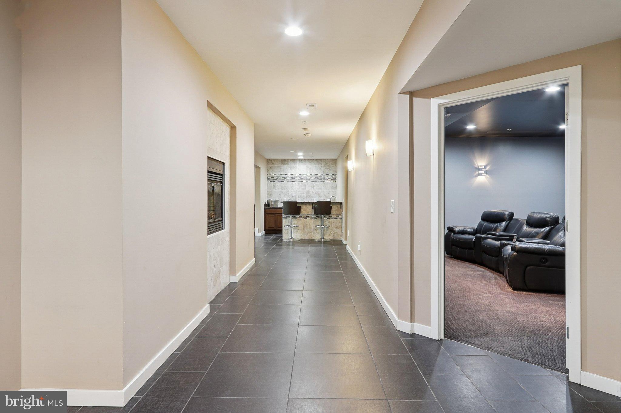 3211 Courtside Road Bowie, MD 20721 - Photo 73 of 108 Spacious hallway leading to cozy entertainment ...