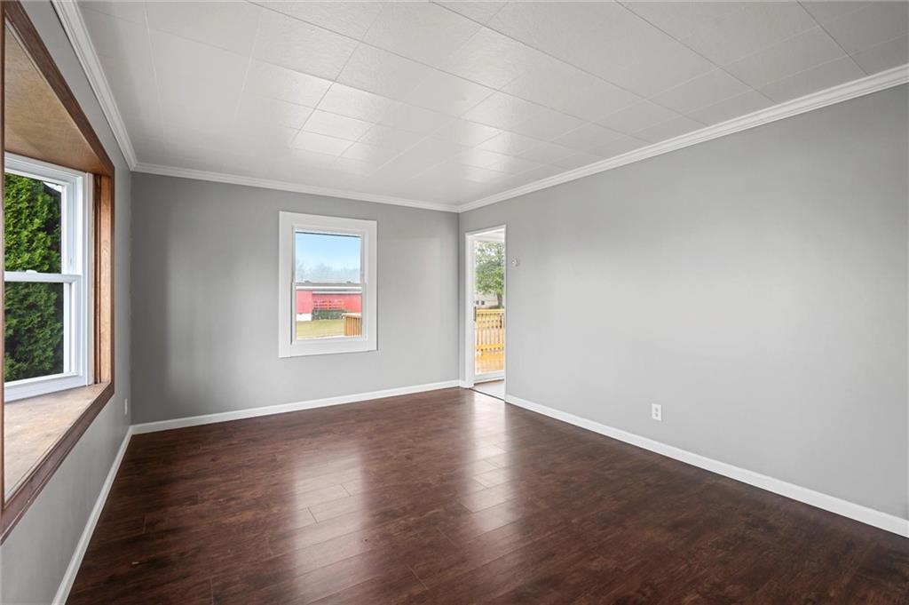 1114 George Street Sharon, PA 16146 - Photo 3 of 29 The bright and cheery living room boasts a bay window that drenches the living room with natural light!