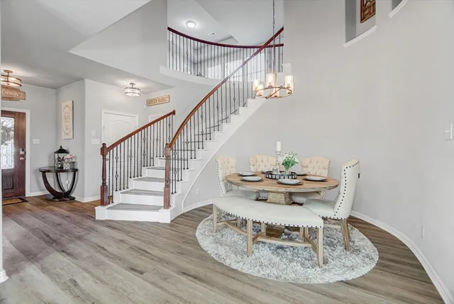a view of a dining room with furniture