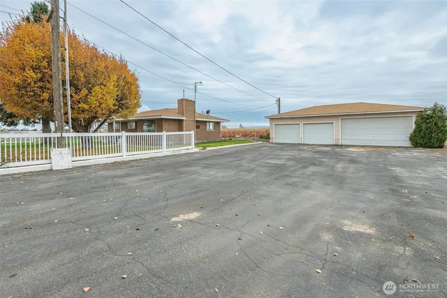 a view of backyard with green space