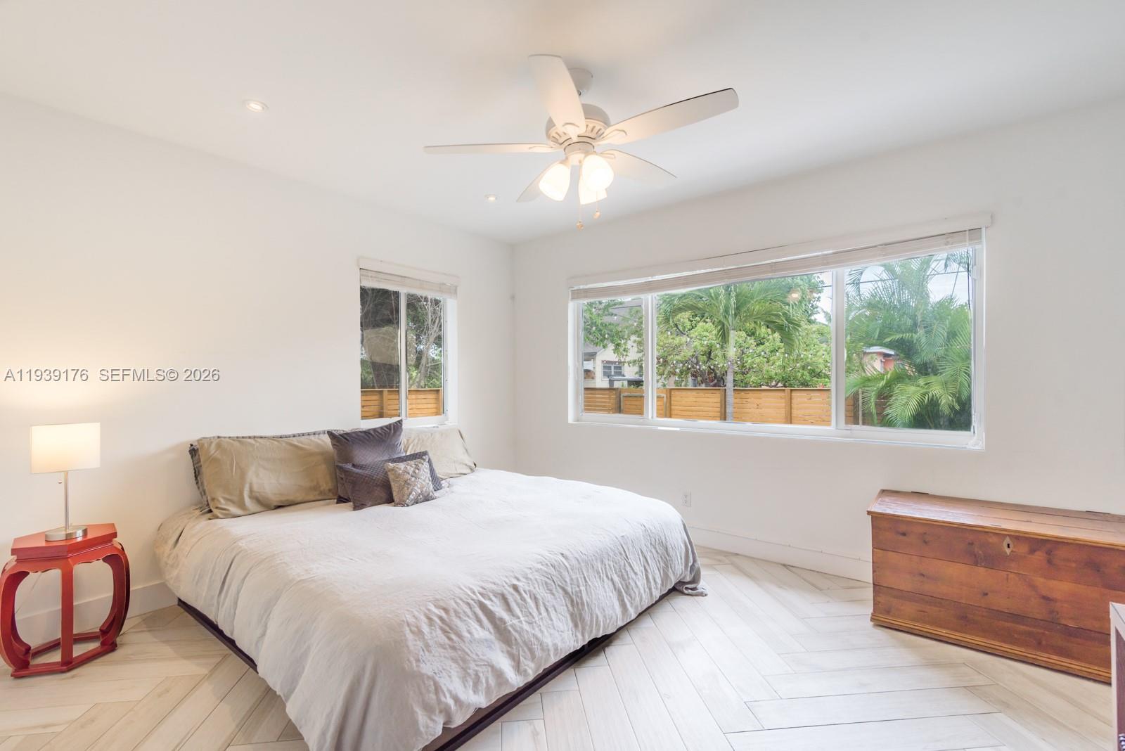 44 Northwest 40th Street Miami, FL 33127 - Photo 15 of 25 a bedroom with a bed and window