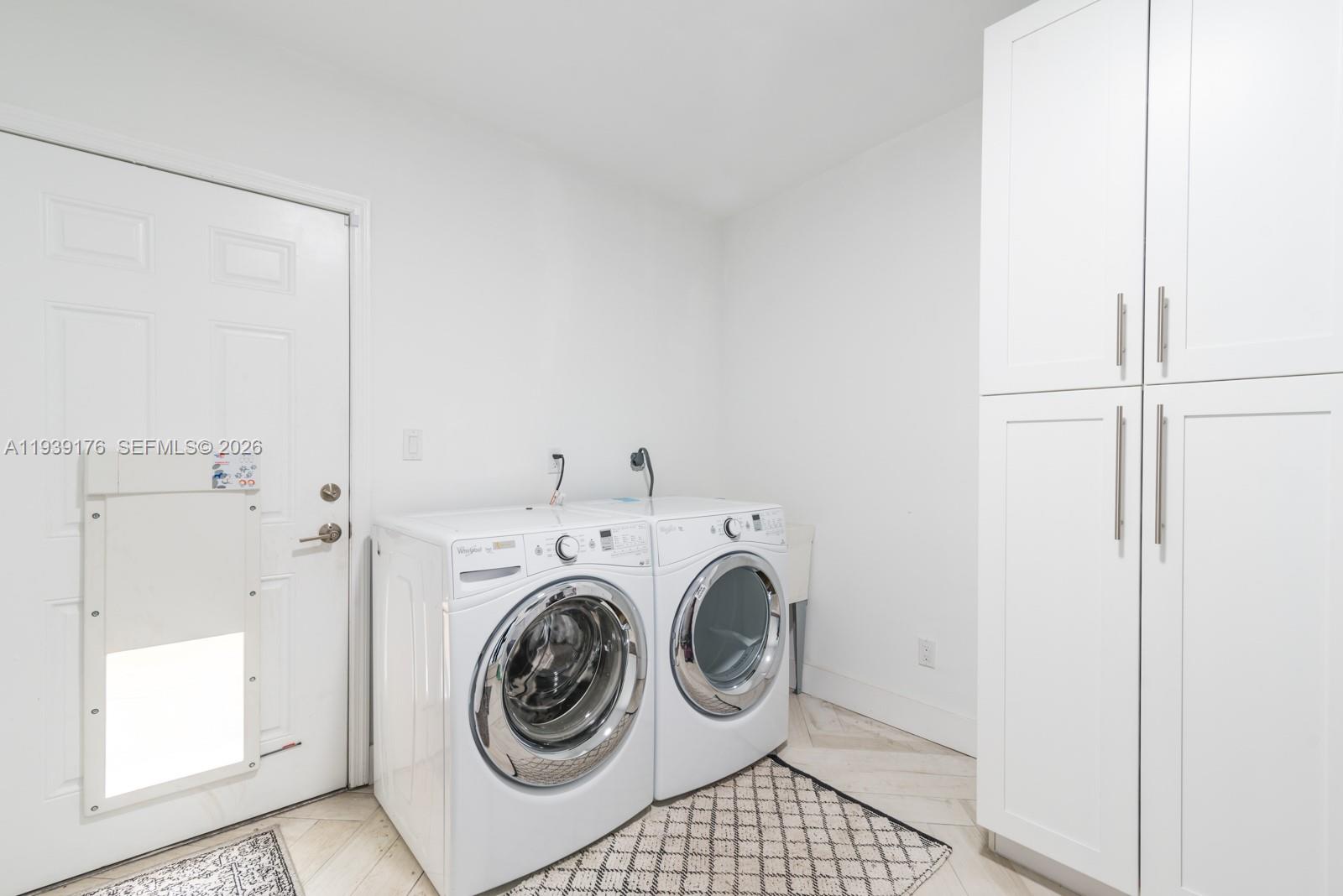 44 Northwest 40th Street Miami, FL 33127 - Photo 20 of 25 a utility room with dryer and washer