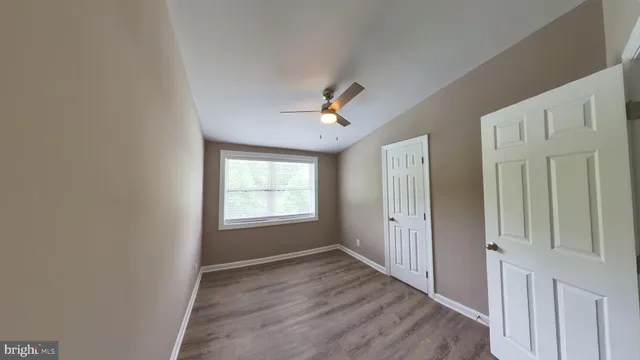 a bathroom with a tub and a shower