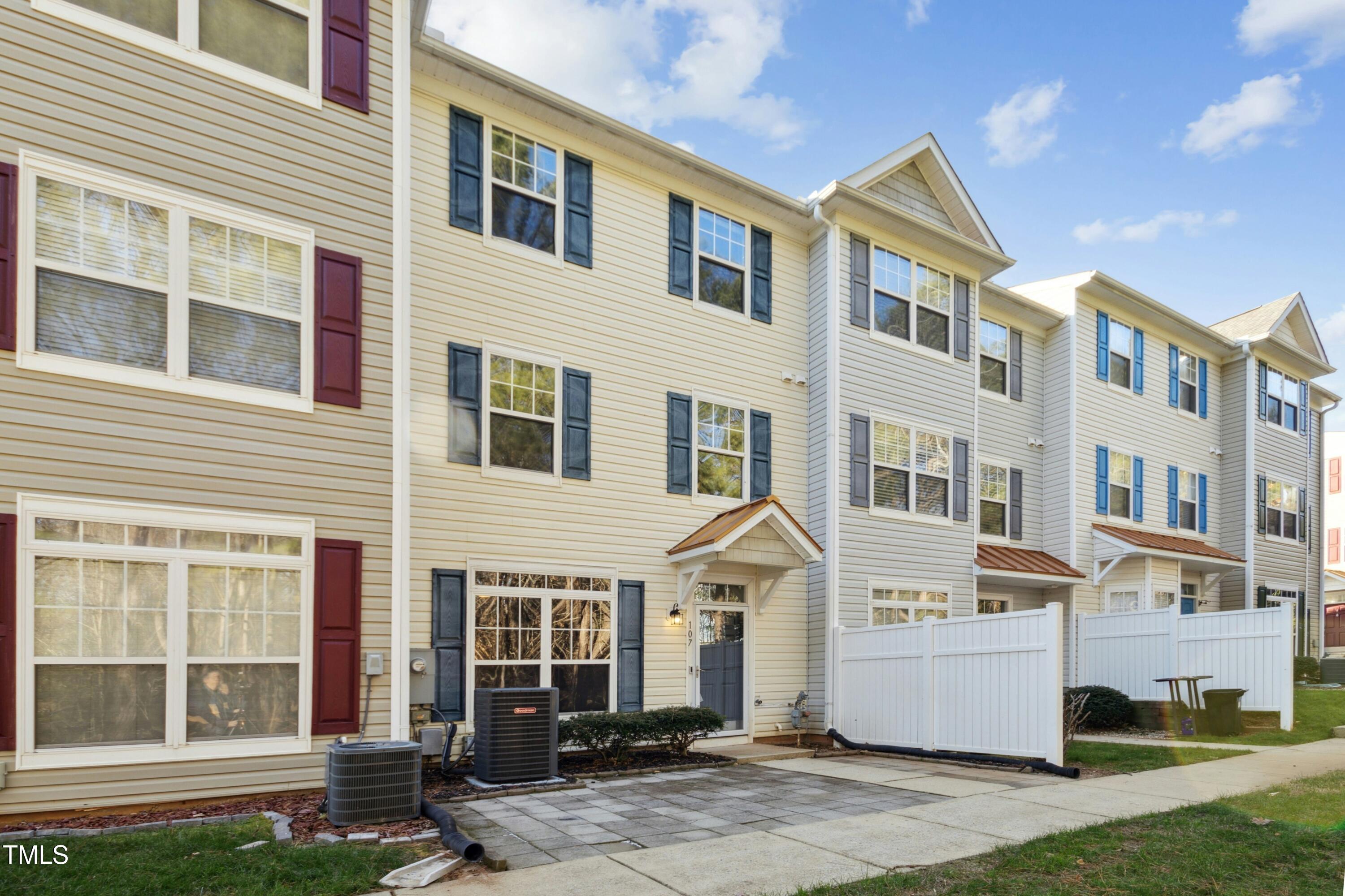 2225 Raven Road, Unit 107 Raleigh, NC 27614 - Photo 2 of 35 a front view of a house with a yard