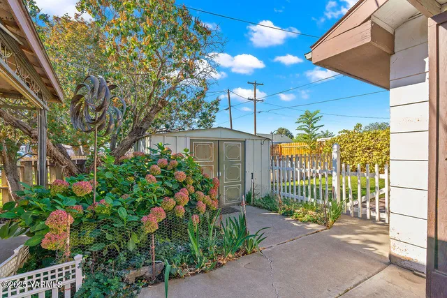 a house view with a garden