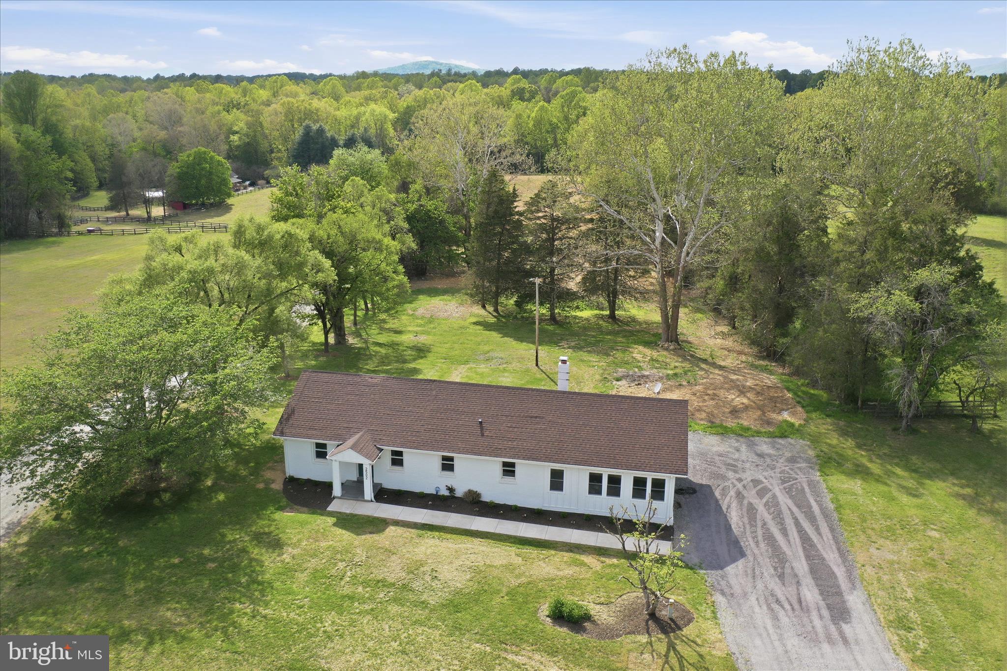 2502 Holly Springs Road Amissville, VA 20106 - Photo 2 of 52 a view of a yard with a swimming pool