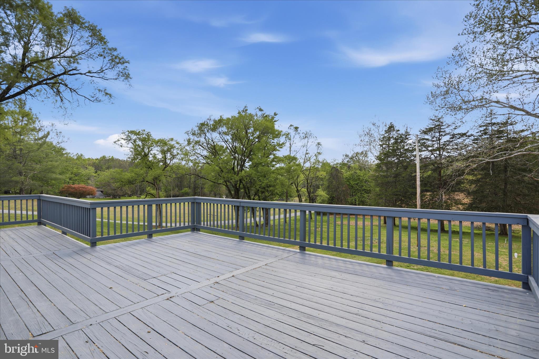 2502 Holly Springs Road Amissville, VA 20106 - Photo 32 of 52 a view of a balcony with wooden fence
