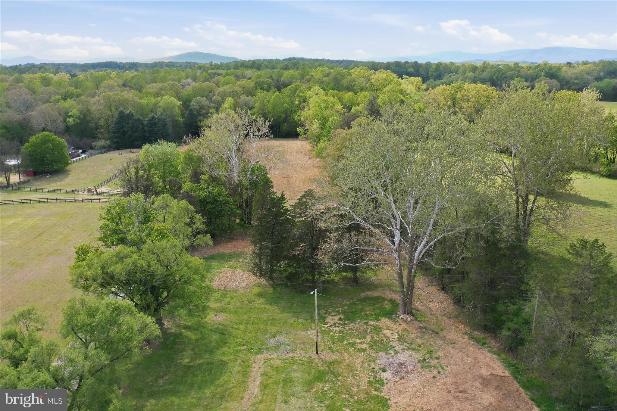 2502 Holly Springs Road Amissville, VA 20106 - Photo 43 of 52 a view of a lake with a city