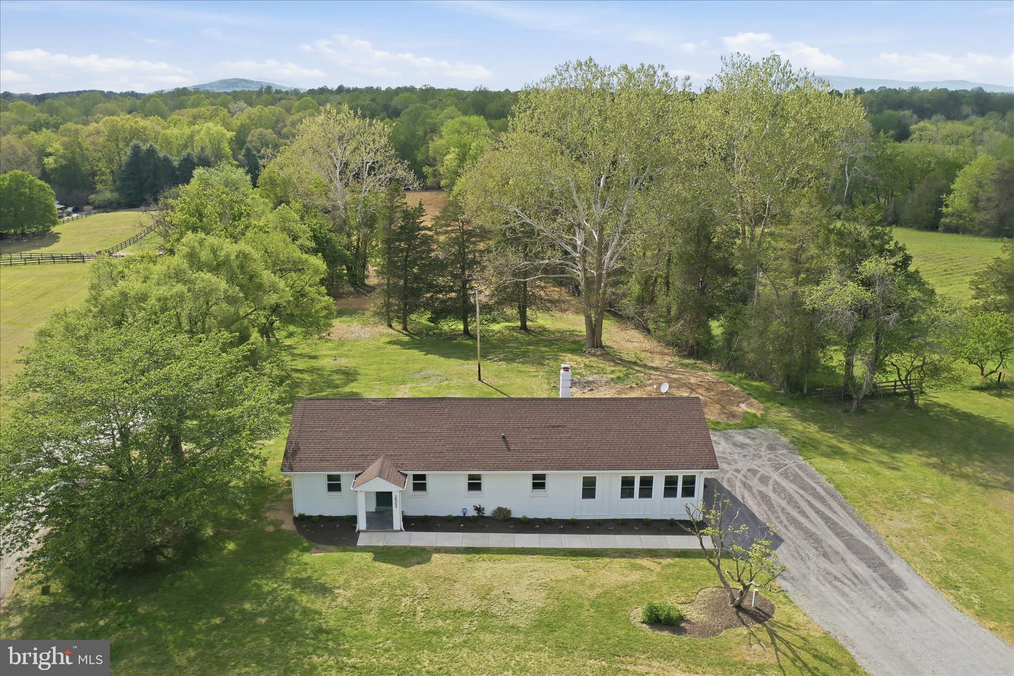 2502 Holly Springs Road Amissville, VA 20106 - Photo 45 of 52 a view of a house with pool and a yard