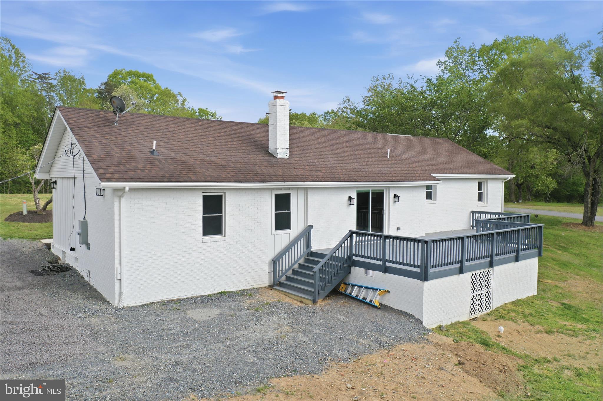 2502 Holly Springs Road Amissville, VA 20106 - Photo 46 of 52 a view of a house with a yard and sitting area
