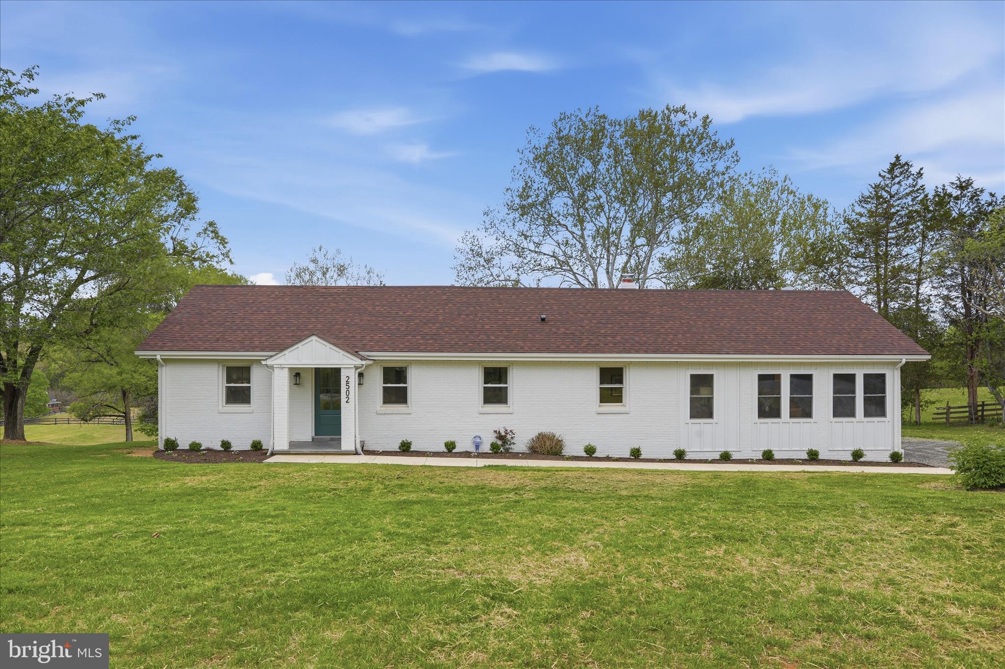 2502 Holly Springs Road Amissville, VA 20106 - Photo 6 of 52 a front view of a house with garden