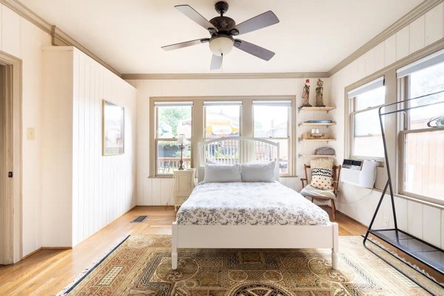 2505 Rosedale Street Houston, TX 77004 - Photo 19 of 39 a bedroom with a bed and a table