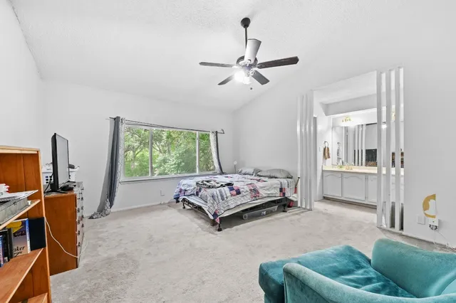 a bathroom with a double vanity sink toilet and shower
