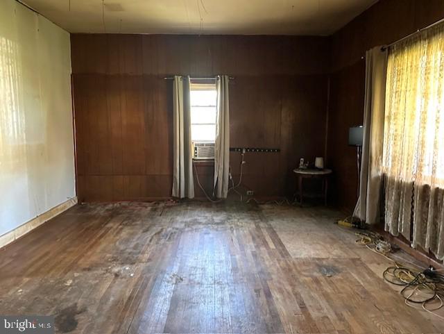 7016 Hyndman Road Buffalo Mills, PA 15534 - Photo 14 of 47 an empty room with wooden floor and windows