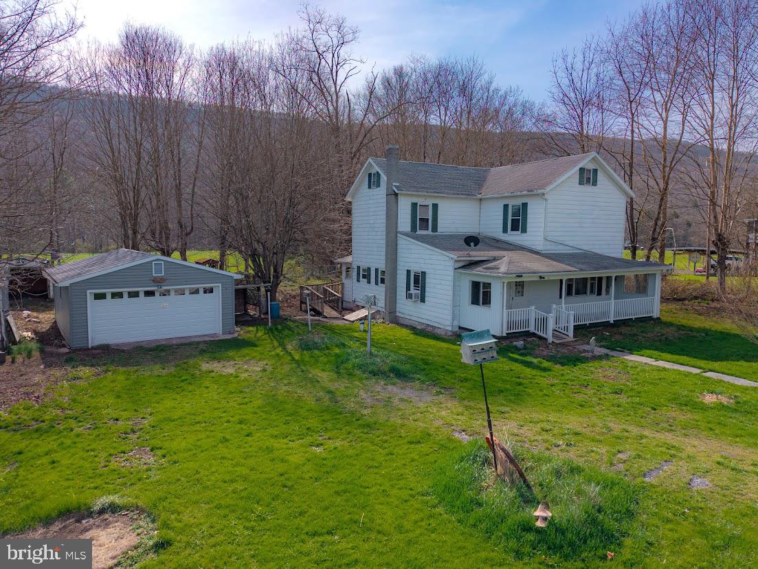 7016 Hyndman Road Buffalo Mills, PA 15534 - Photo 2 of 47 a view of a house with a yard balcony and sitting area