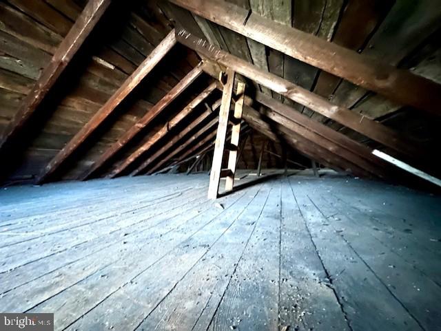 7016 Hyndman Road Buffalo Mills, PA 15534 - Photo 25 of 47 a view of an empty room with wooden floor