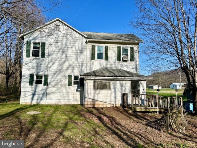 7016 Hyndman Road Buffalo Mills, PA 15534 - Photo 3 of 47 a front view of a house with a yard