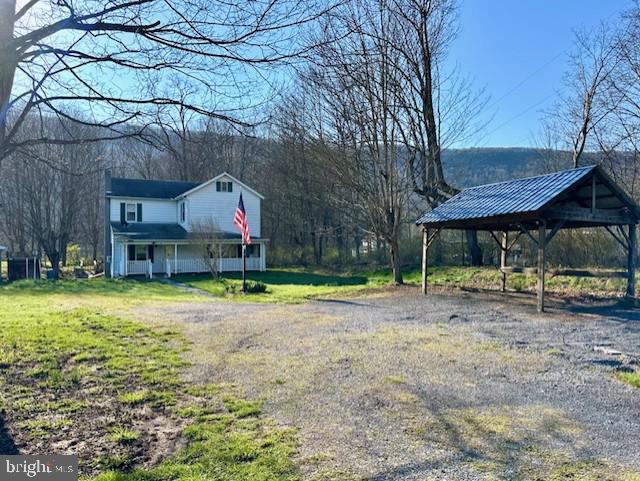 7016 Hyndman Road Buffalo Mills, PA 15534 - Photo 34 of 47 a view of a house with a yard and sitting area