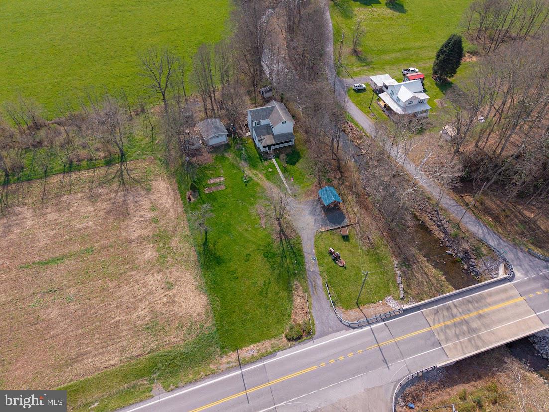 7016 Hyndman Road Buffalo Mills, PA 15534 - Photo 42 of 47 an aerial view of a house with a yard