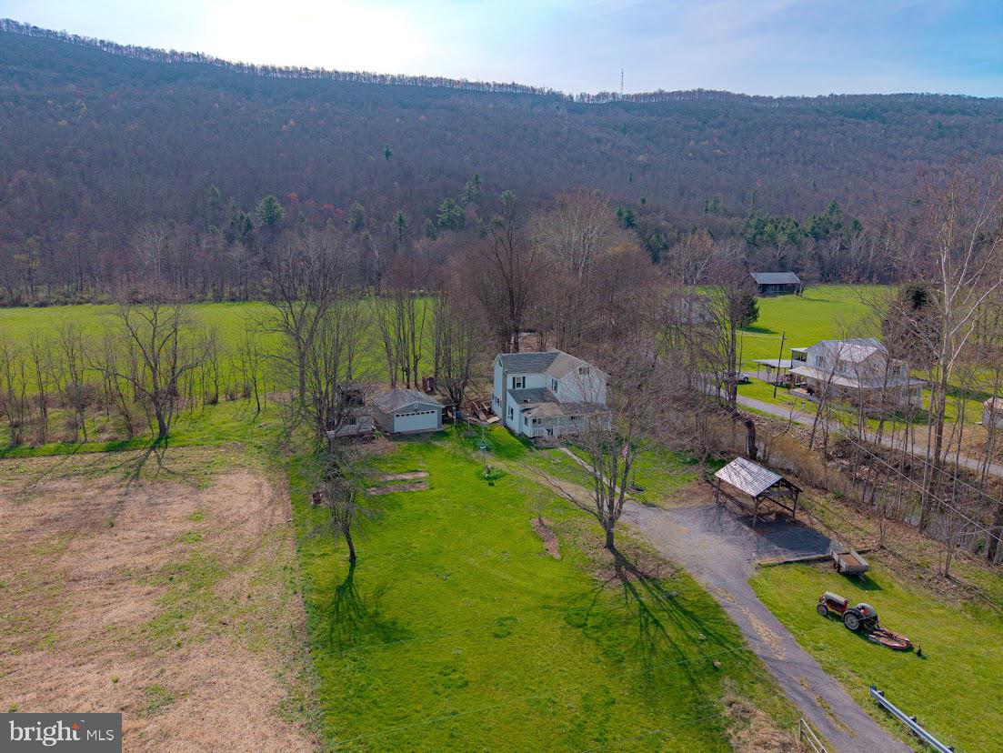 7016 Hyndman Road Buffalo Mills, PA 15534 - Photo 44 of 47 an aerial view of a house with a yard