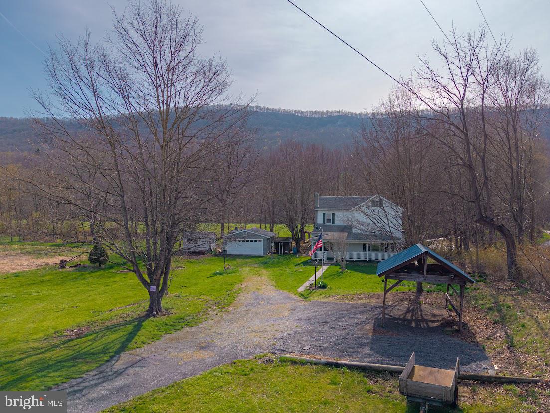 7016 Hyndman Road Buffalo Mills, PA 15534 - Photo 45 of 47 a aerial view of a house with swimming pool and big yard