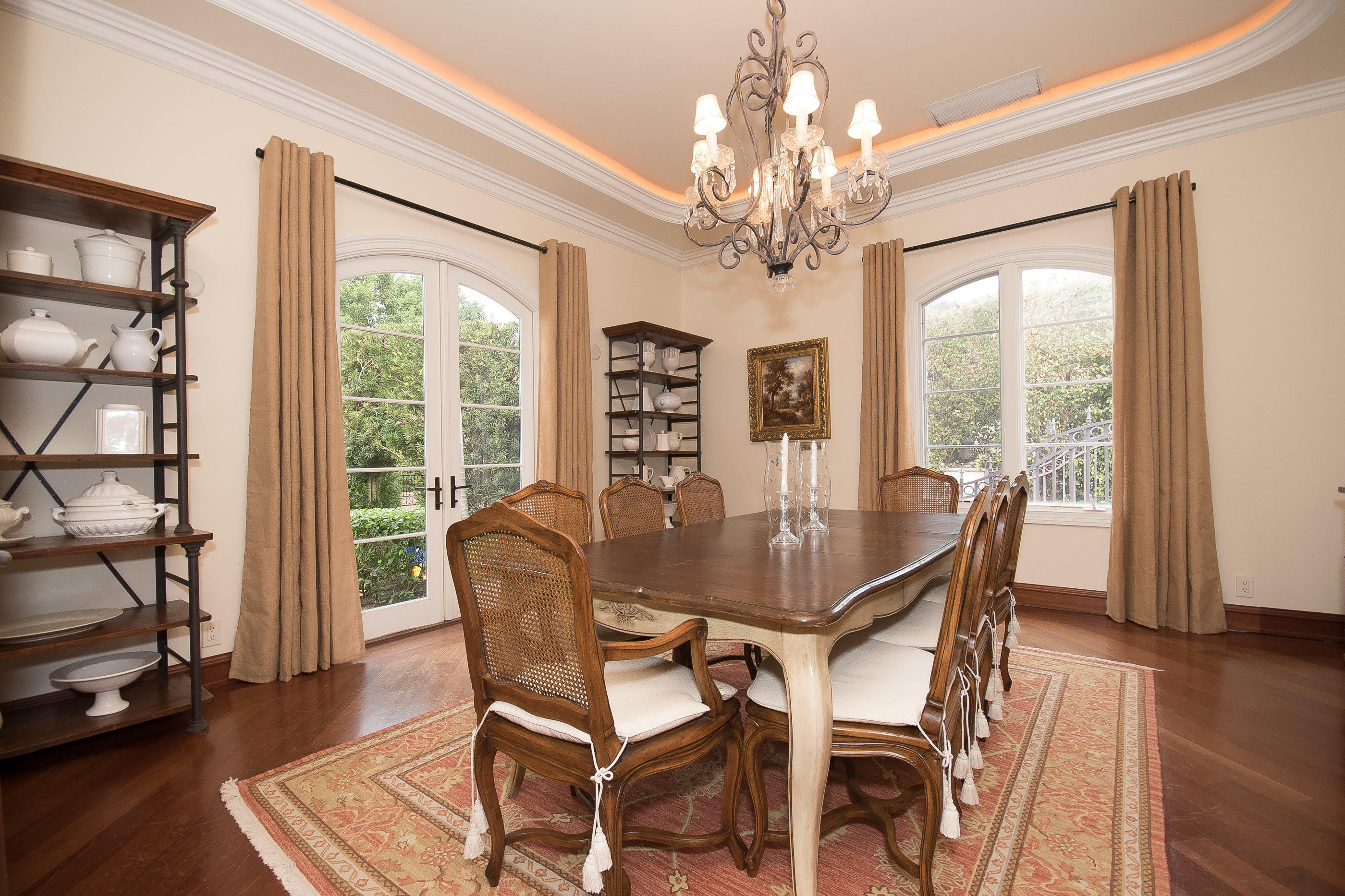 150 Woodbridge Road Palm Beach, FL 33480 - Photo 11 of 32 a view of a dining room with furniture window and wooden floor