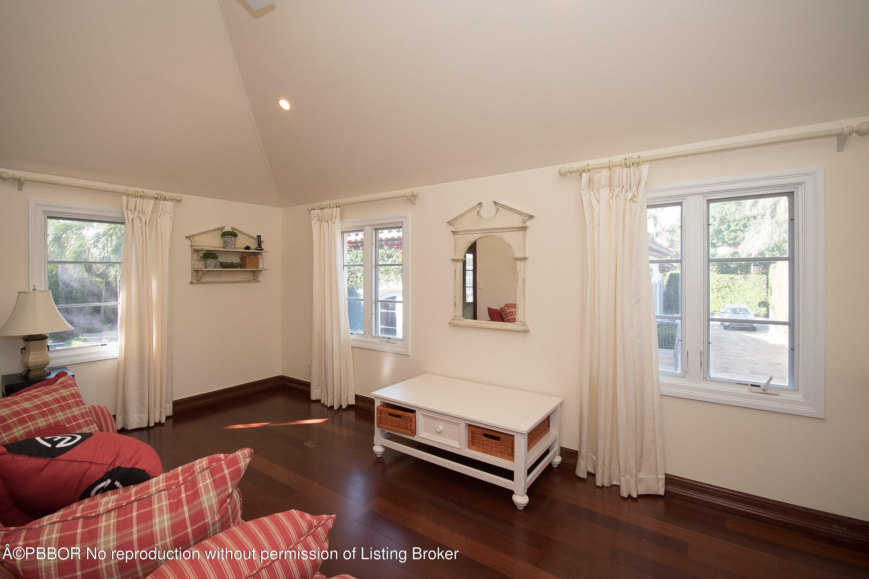 150 Woodbridge Road Palm Beach, FL 33480 - Photo 24 of 32 a bedroom with a bed and a window