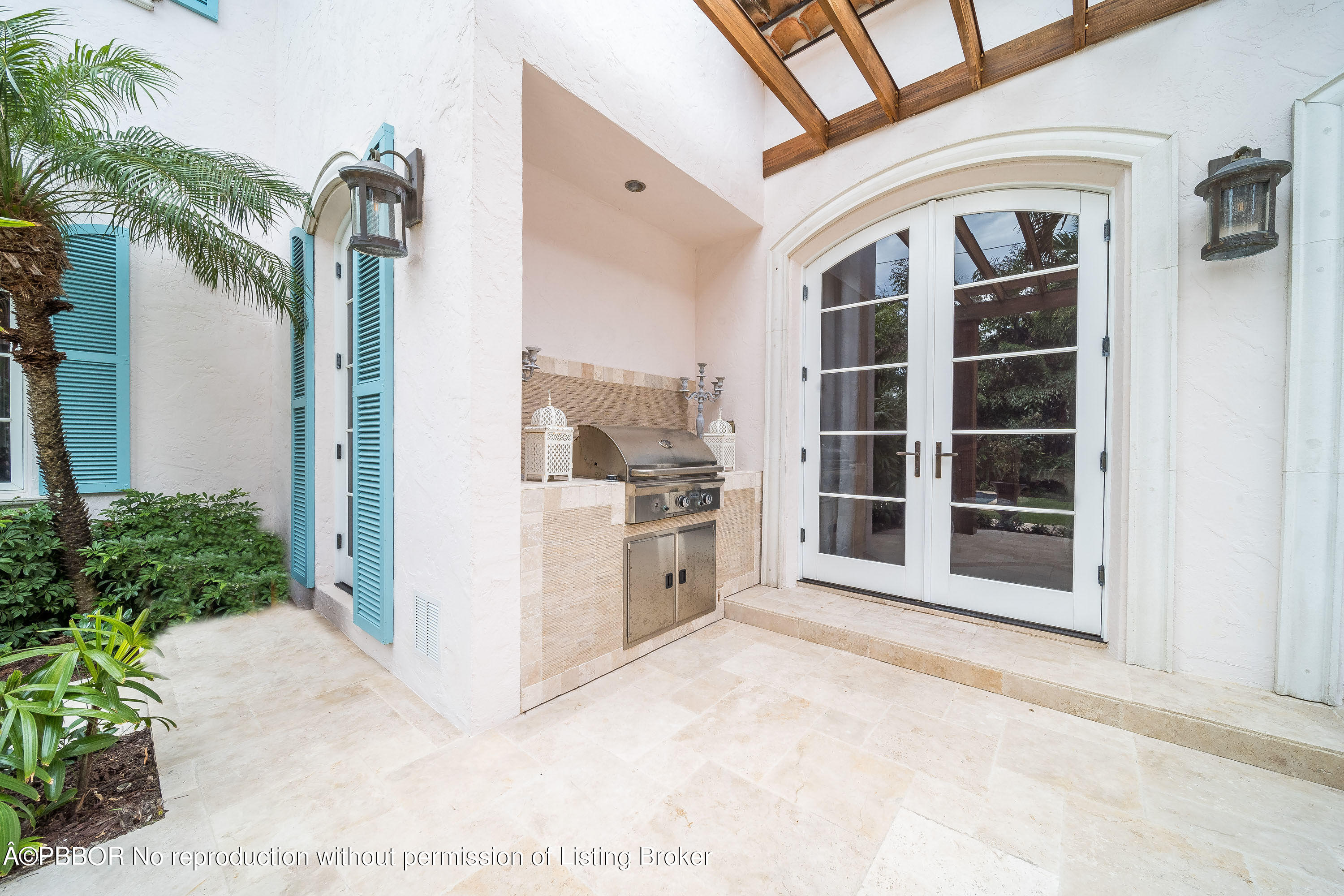 150 Woodbridge Road Palm Beach, FL 33480 - Photo 27 of 32 a view of front door of house