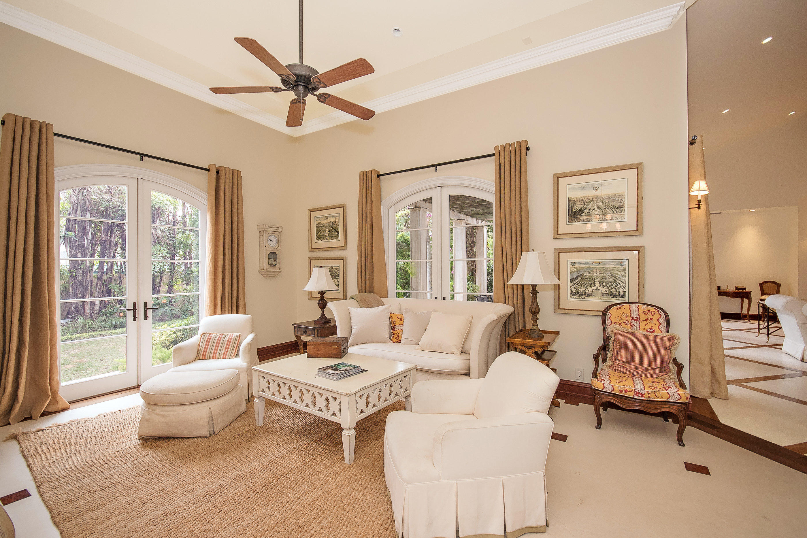 150 Woodbridge Road Palm Beach, FL 33480 - Photo 7 of 32 a living room with furniture and a large window