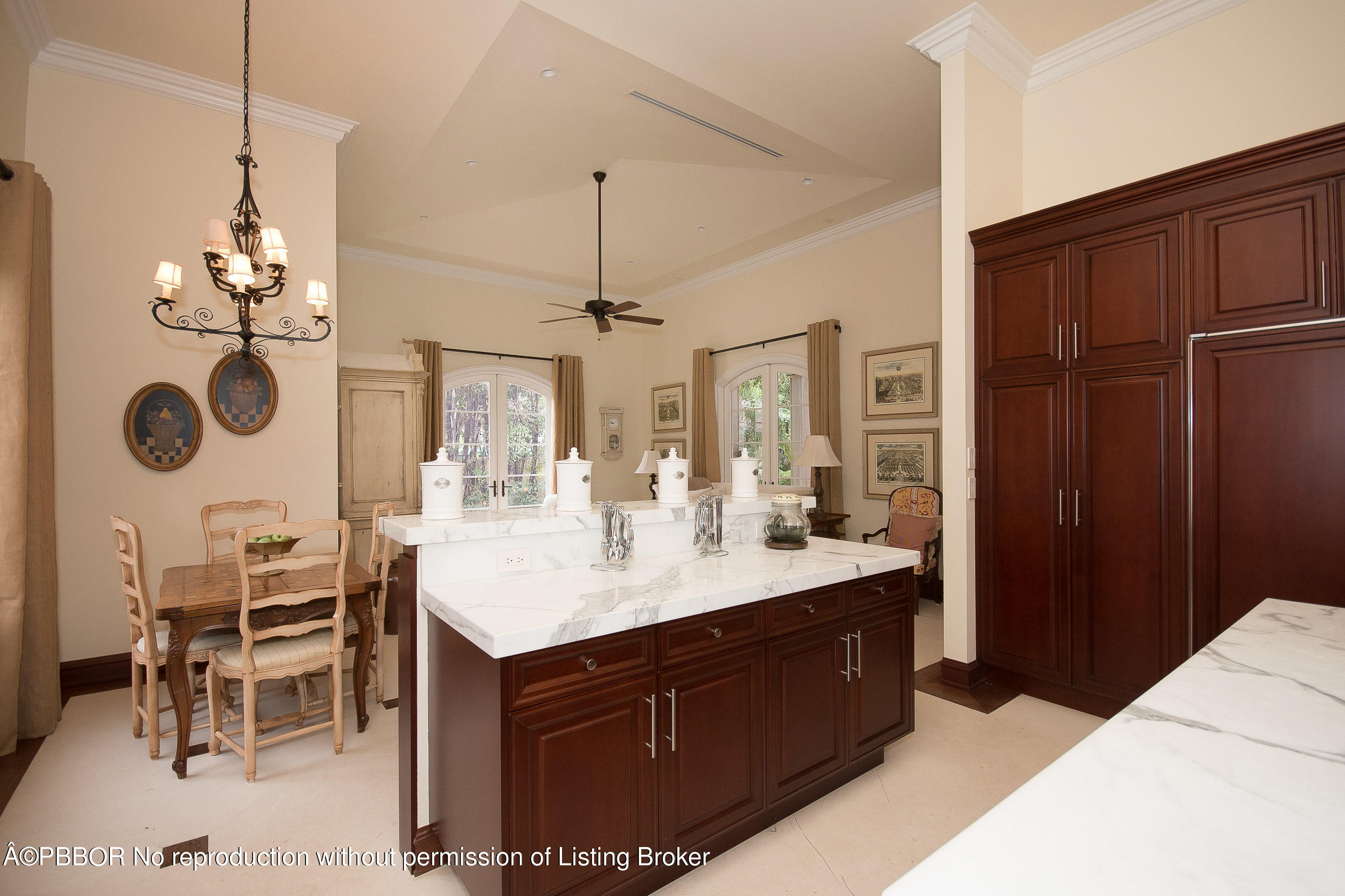 150 Woodbridge Road Palm Beach, FL 33480 - Photo 10 of 32 a en suite bathroom with a sink mirror and a shower