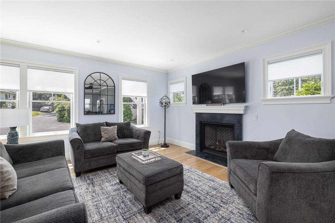 3 Oak Street Middletown, RI 02842 - Photo 19 of 50 Living room with gas fireplace.