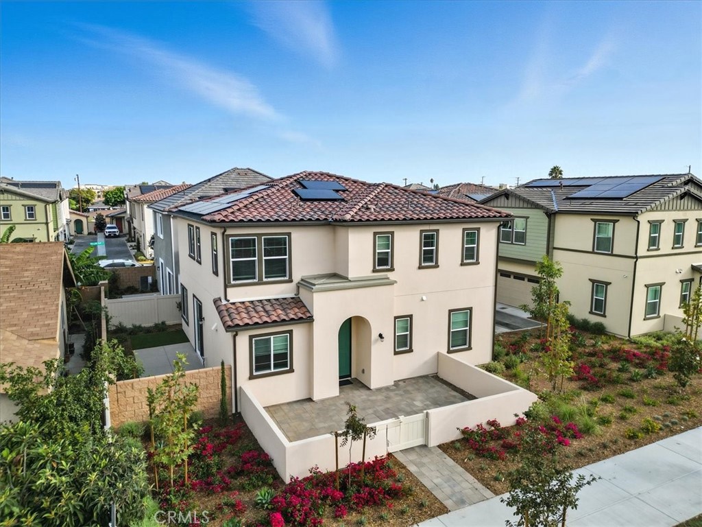 413 East 220th Street Carson, CA 90745 - Photo 3 of 15 a front view of a house with garden