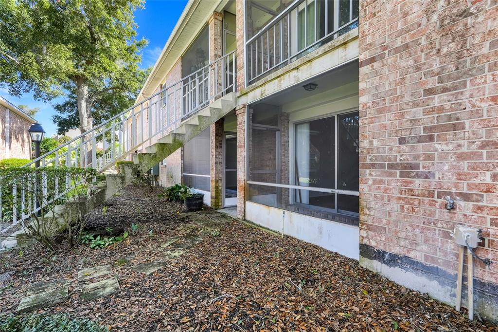 4312 Lake Underhill Road, Unit 19 Orlando, FL 32803 - Photo 23 of 43 a view of a brick building with many windows