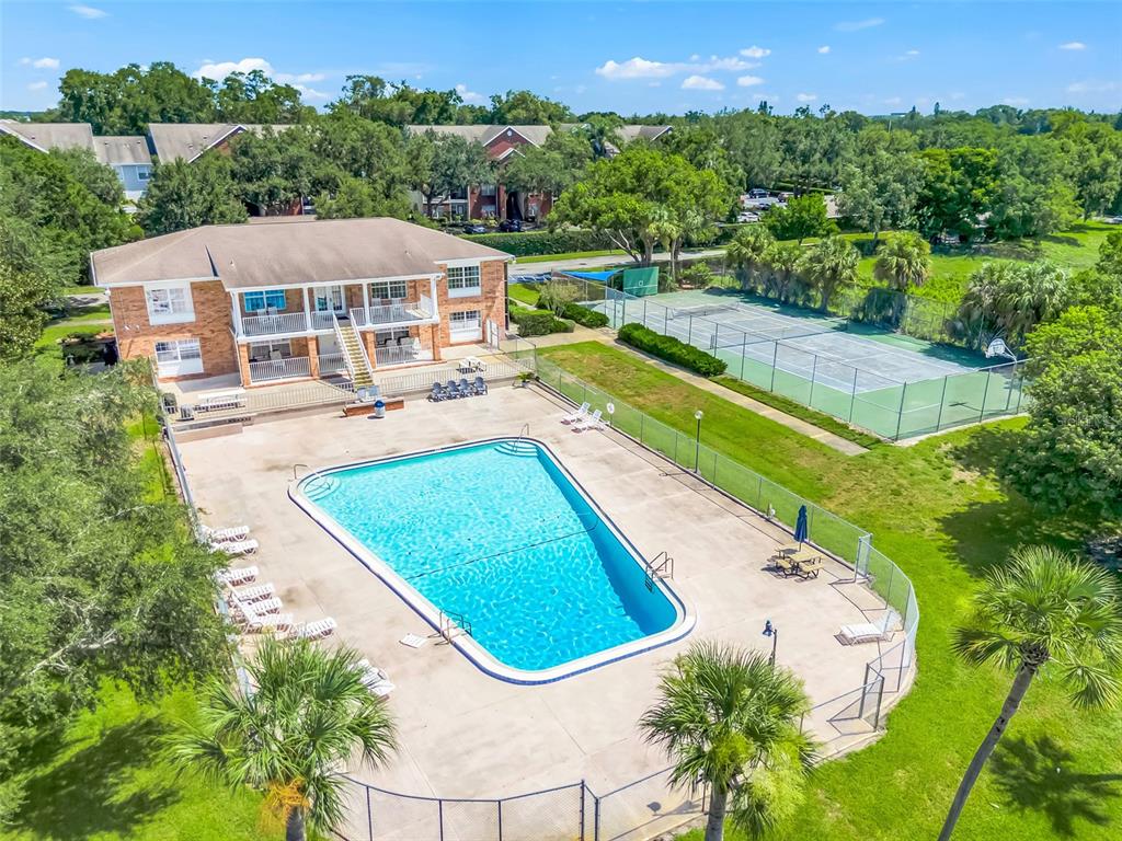 4312 Lake Underhill Road, Unit 19 Orlando, FL 32803 - Photo 38 of 43 an aerial view of a house with swimming pool patio and outdoor seating