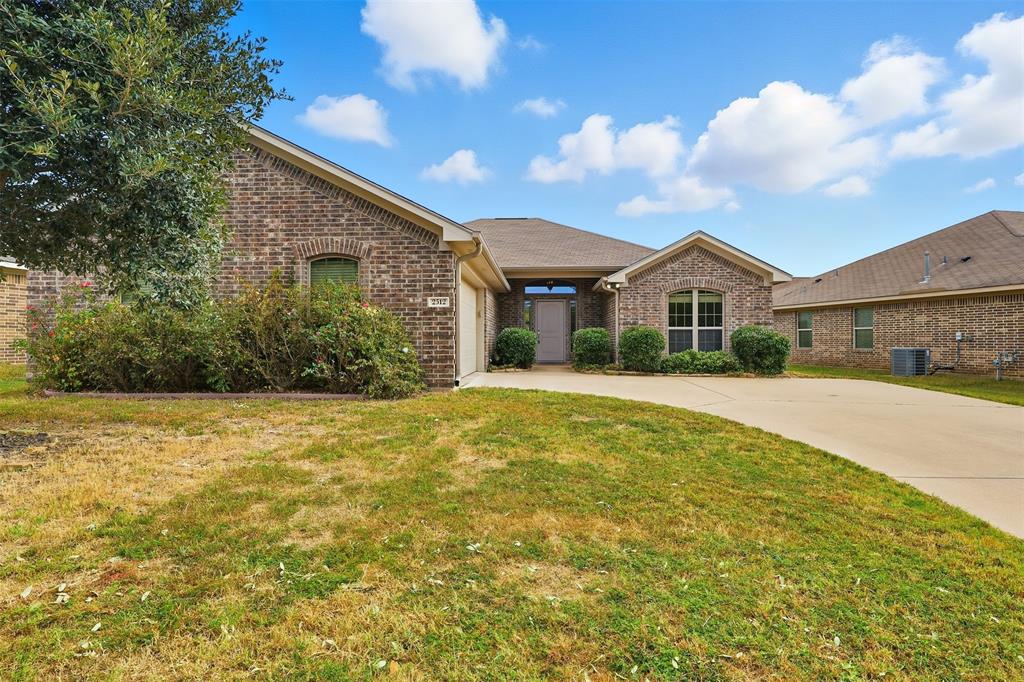 2512 Guinn Farms Road Tyler, TX 75707 - Photo 3 of 29 a view of a house with a yard
