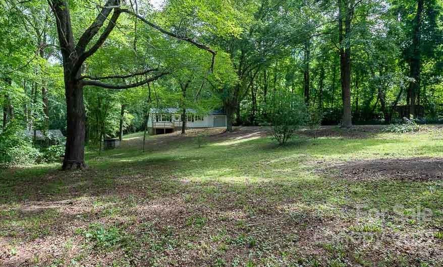 150 Archer Road Salisbury, NC 28147 - Photo 2 of 20 a view of a yard with a tree