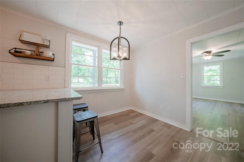 150 Archer Road Salisbury, NC 28147 - Photo 6 of 20 a view of a livingroom with wooden floor and a window