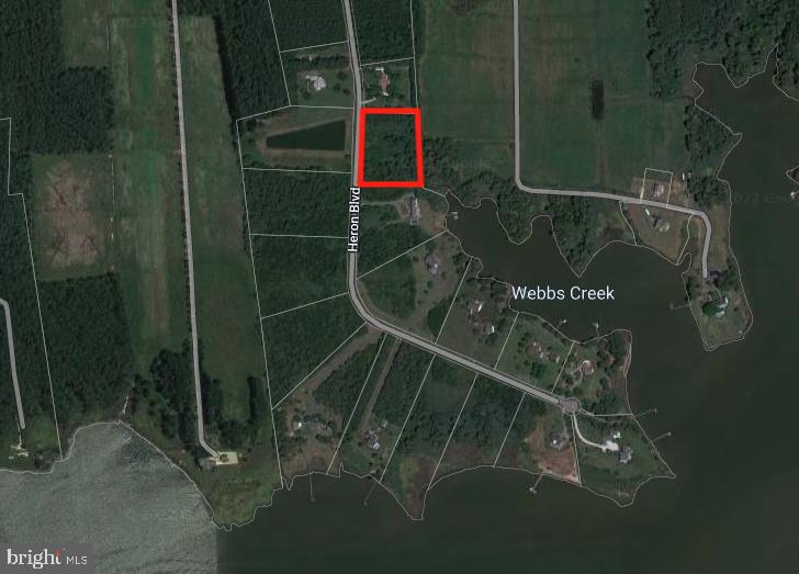 5219 Heron Boulevard Cambridge, MD 21613 - Photo 2 of 8 a bathroom with a shower