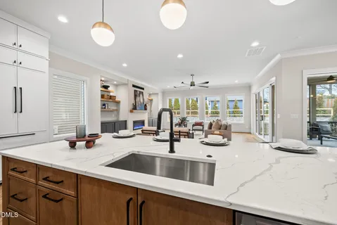 a kitchen with counter top space a sink and cabinets