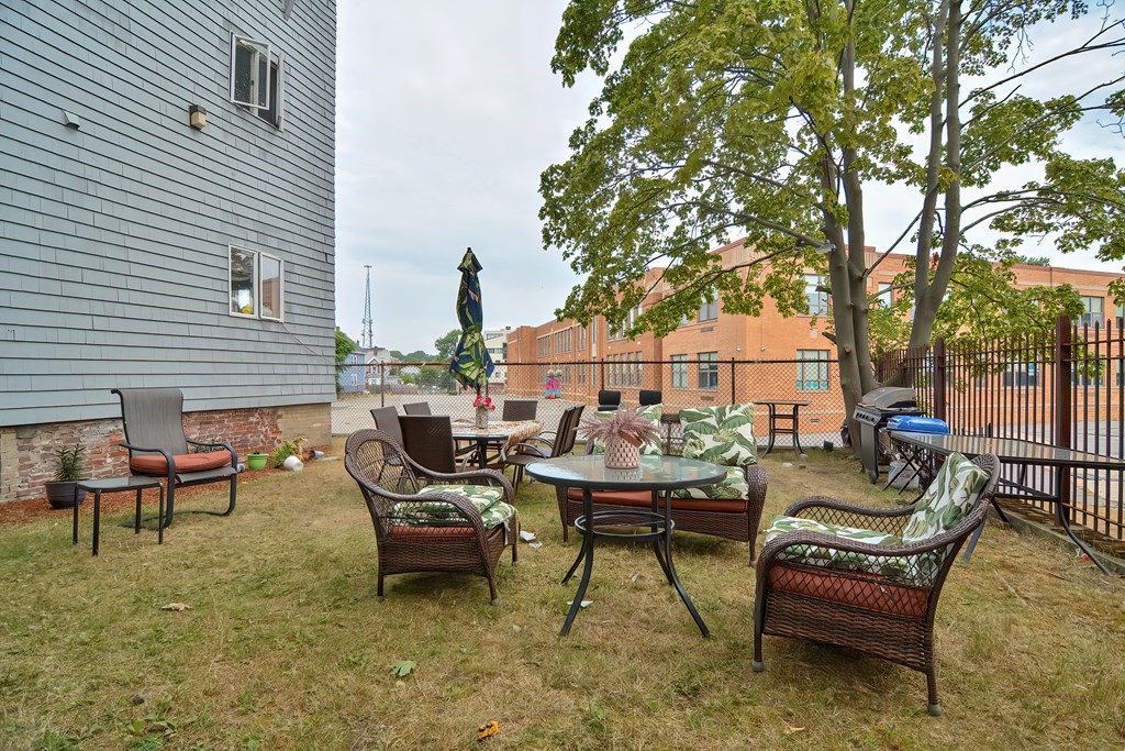 87 Broad Street, Unit 2 Lynn, MA 01902 - Photo 27 of 28 a outdoor living space with furniture and garden view