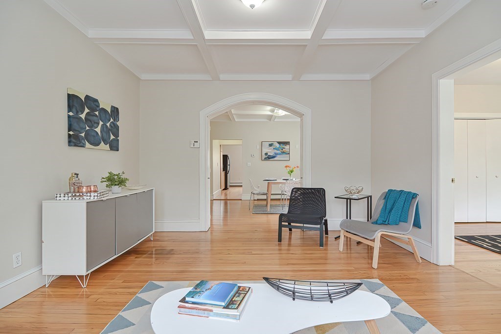87 Broad Street, Unit 2 Lynn, MA 01902 - Photo 6 of 28 a view of living room with furniture and wooden floor