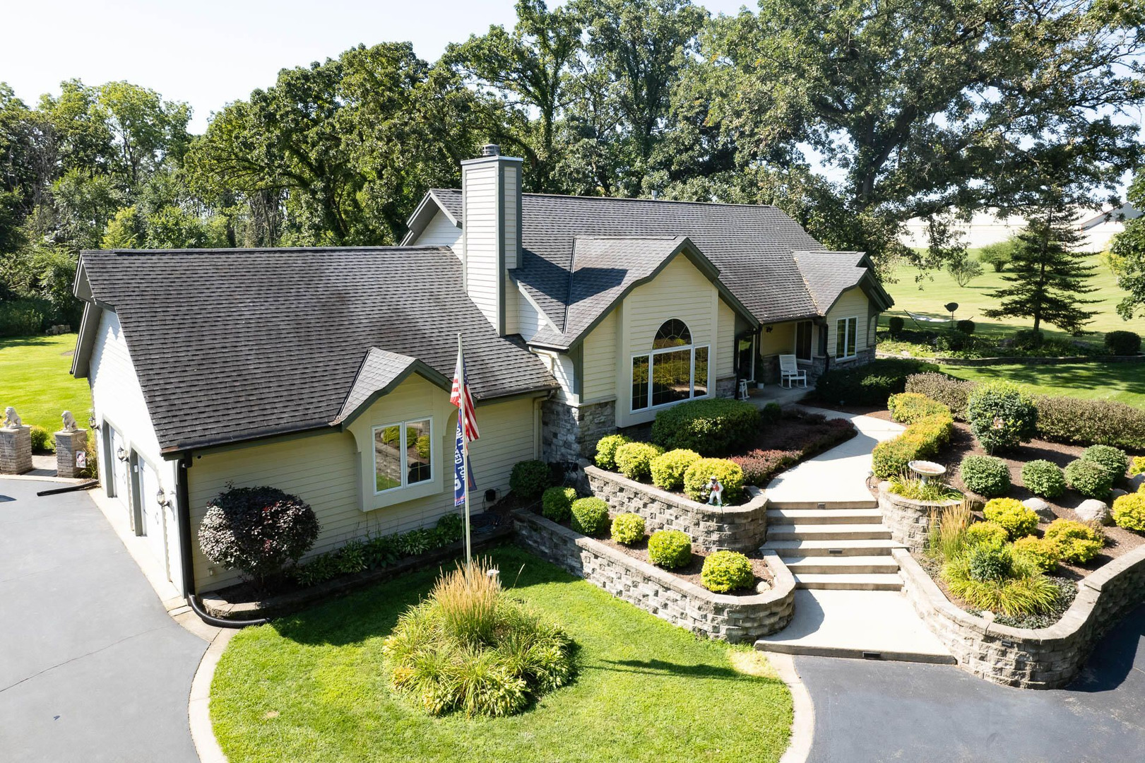 W7939 Sweet Road Darien, WI 53114 - Photo 1 of 1 a front view of a house with a yard and outdoor seating