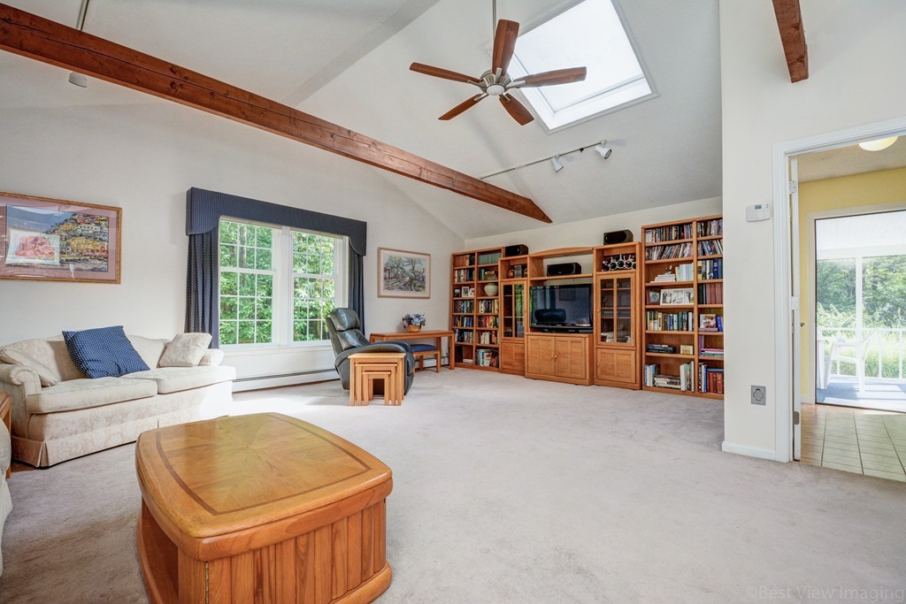 351 Liberty Square Road Boxborough, MA 01719 - Photo 16 of 30 a living room with furniture and a large window