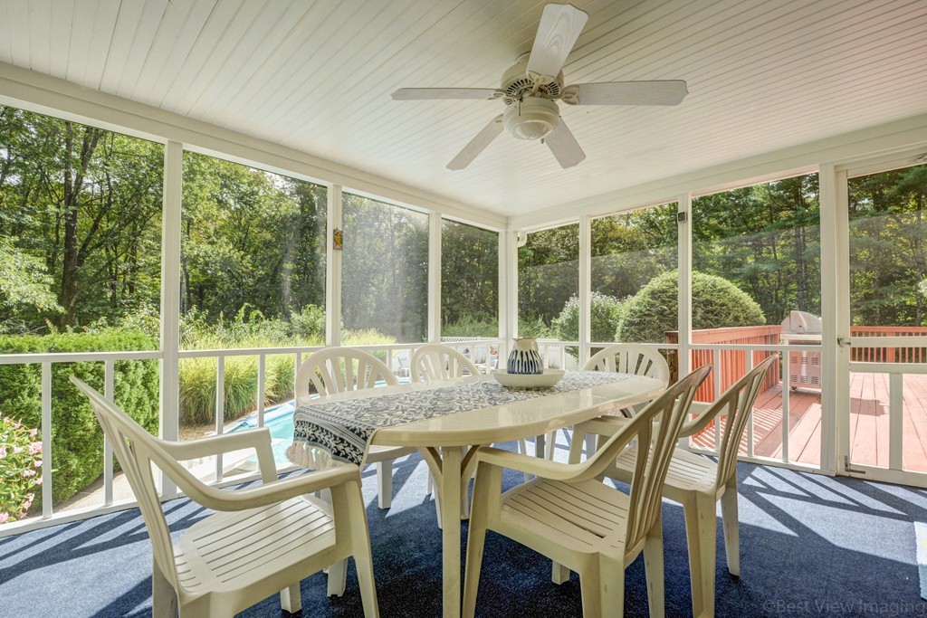 351 Liberty Square Road Boxborough, MA 01719 - Photo 19 of 30 a view of a dining room with furniture window and outside view