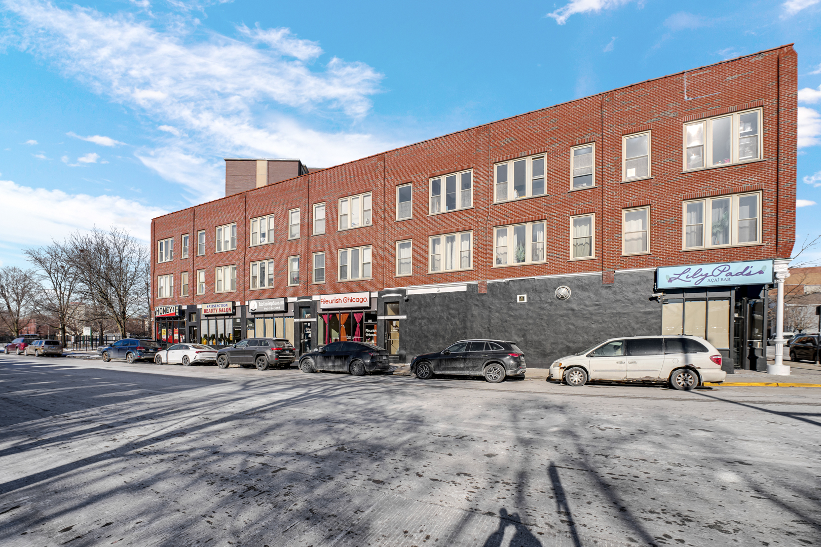 752 East 43rd Street, Unit 2E Chicago, IL 60653 - Photo 19 of 20 a buildings with car parked in front of it