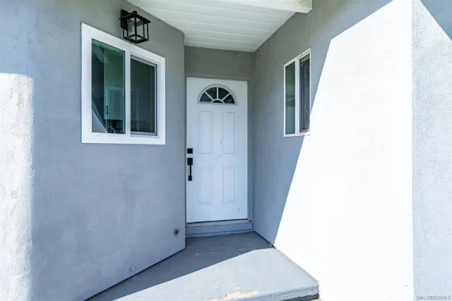 a view of an entryway with a window