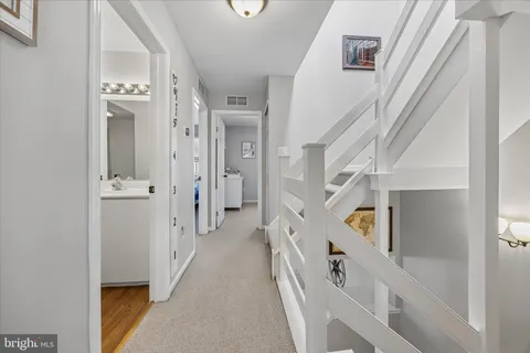 a view of an entryway with staircase