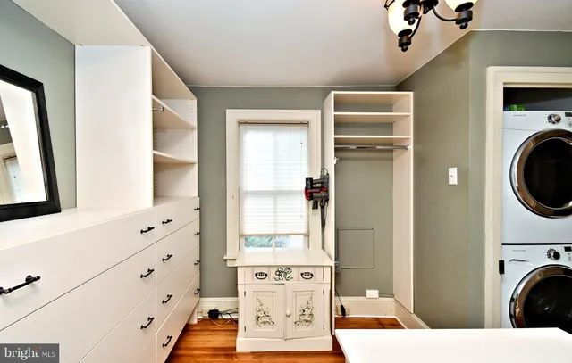 a kitchen with stainless steel appliances cabinets and a counter top space